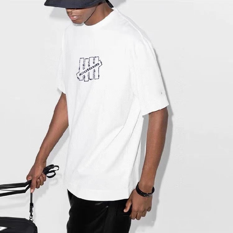 Undefeated Neighbourhood Scribble Middle Logo (white)