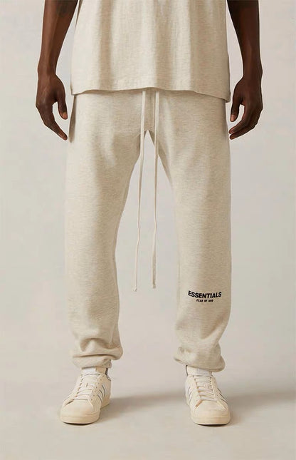 FEAR OF GOD ESSENTIALS Tapered Logo-Flocked Cotton-Blend Jersey Sweatpants SS22